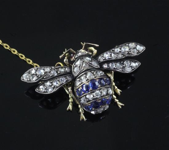 An Edwardian gold and silver, sapphire and diamond bee brooch, 35mm.